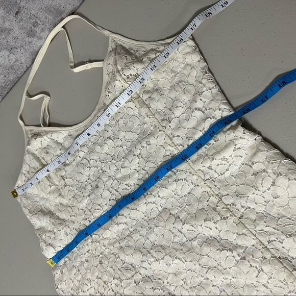 aritzia Talula Shibuya Crisscross Lace Ruffle Hem Eyelet Mini Dress - Picture 11 of 11